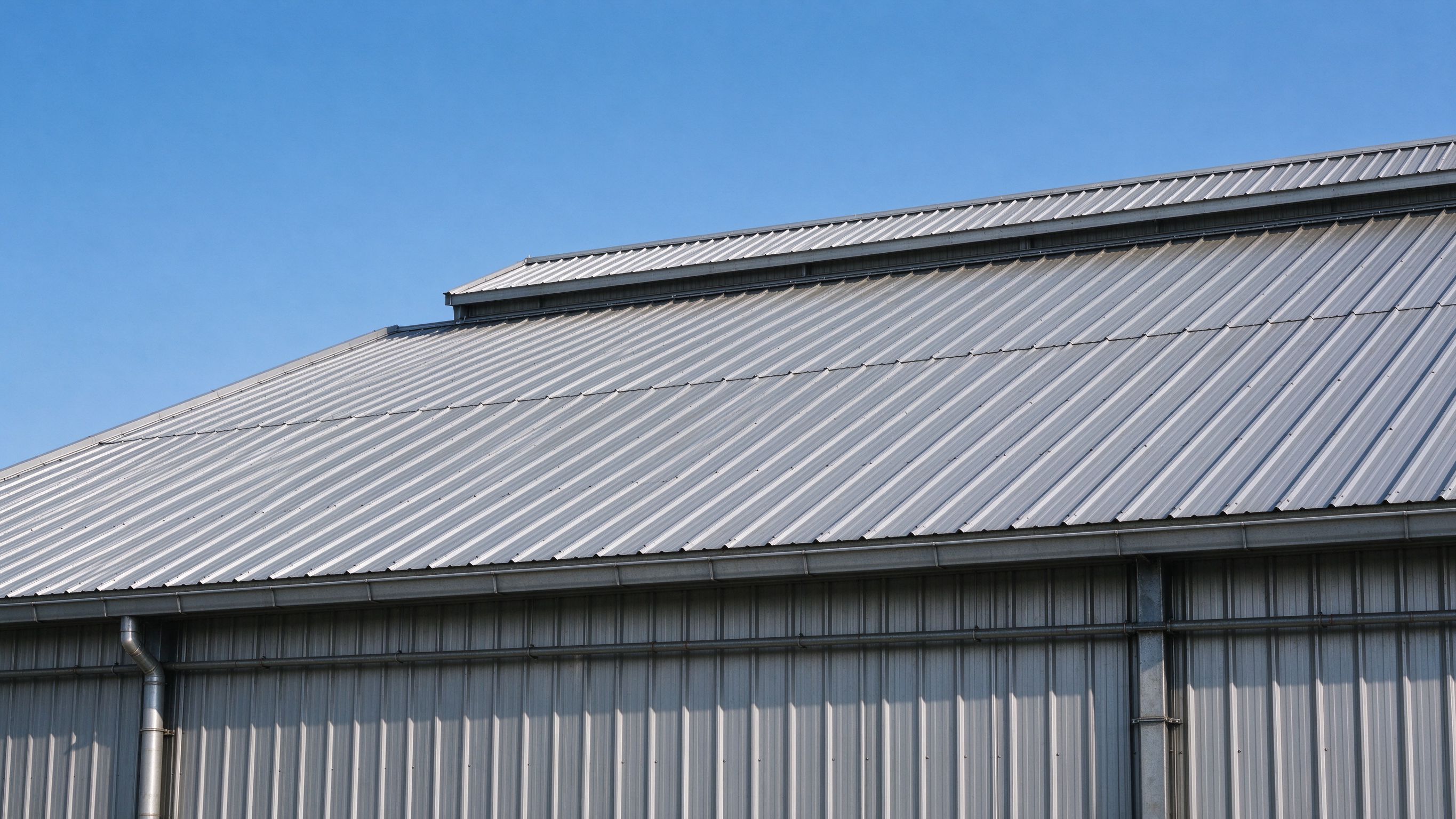 Roof ridge and flashing details on a steel building (illustrative concept image)