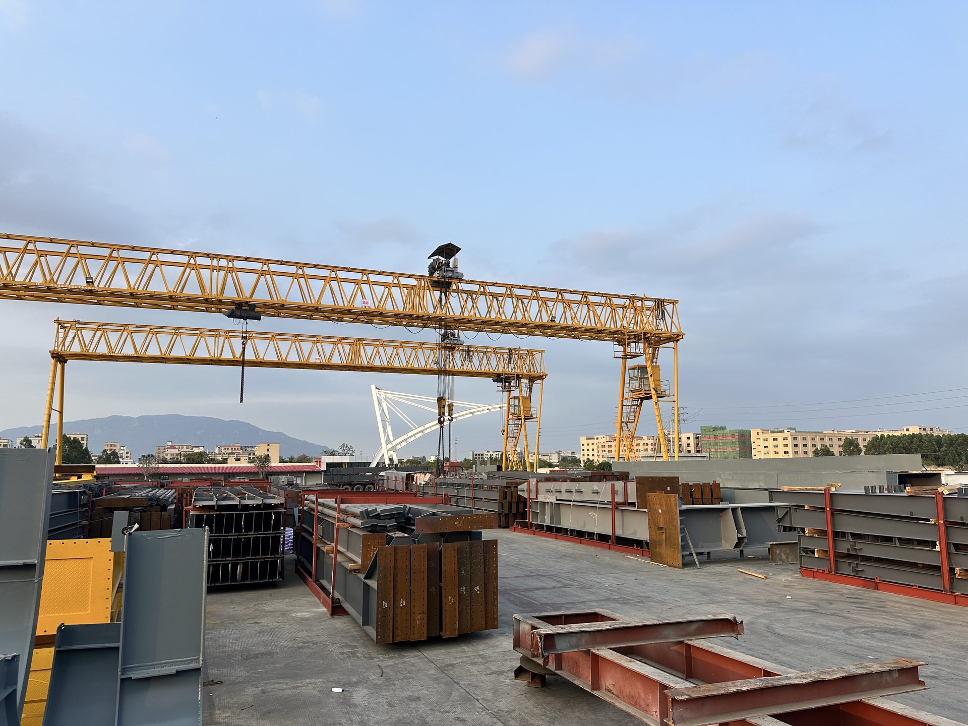 Factory yard with gantry crane for steel material storage
