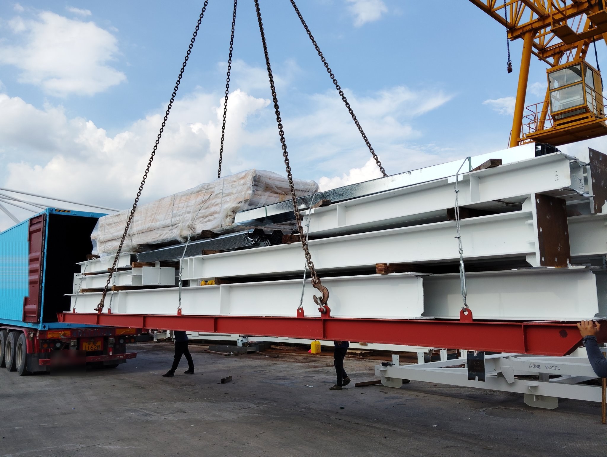 Steel structure components loaded for shipment to the port